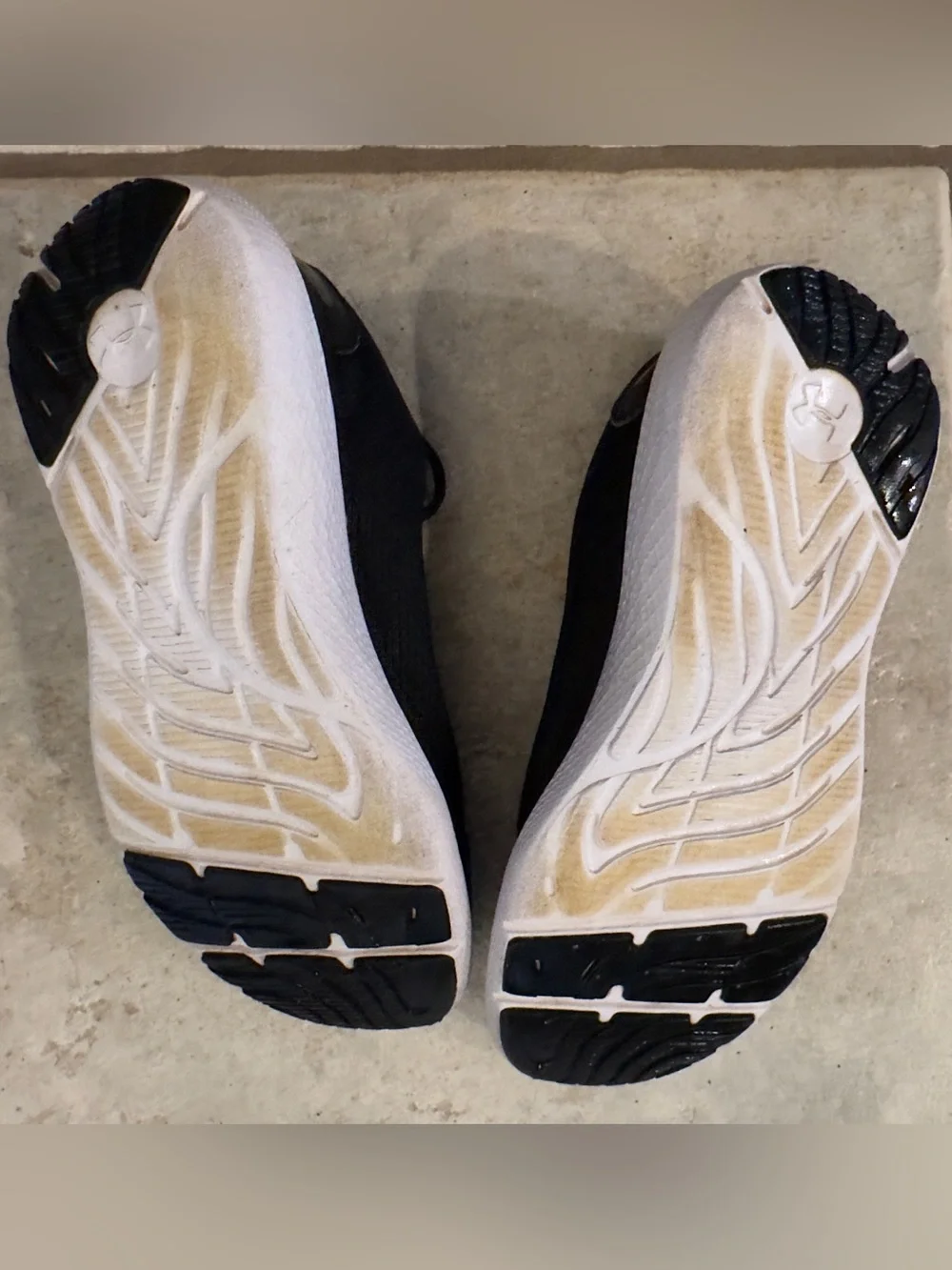 Under Armour Kids Black Athletic Running Shoes with White Soles